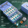 ¡Guau! Caja de Empaque de Té Nueva Personalizada de Gama Alta Estilo Nacional Caja Vacía Conveniente 20 Latas Empaque Pequeño para Té Dúplex