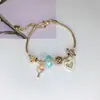 Pulsera Elegante de Aleación Galvanizada con Broche de Langosta y Trébol de Cuatro Hojas para Mujer, Más Vendida en el Sudeste Asiático, Joyería de Dibujos Animados en Stock, Hecha a Mano