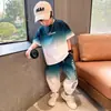 Conjunto de Verano para Niños 2026 Nuevo Estilo Hecho a Medida Fresca Camiseta de Manga Corta Pantalones de Cinco Puntos Modernos Conjunto de Dos Piezas para Niños