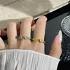 Anel de zircônia cúbica em formato de coração com padrão de mola espiral minimalista, uma peça nova e fashion para mulheres, adequado para uso diário e versátil em estilo, com abertura ajustável