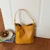 Bolsa de Balde Tecida Artesanal Retro Transfronteiriça Feminina Verão 2026 Nova Moda Versátil Grande Capacidade Ombro Único Transversal