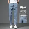 Jeans cropped de seda helada delgados de verano para hombre, corte recto holgado, nuevo modelo 2026, pantalones casuales de Tencel ultrafinos de 9 puntos