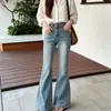 Tiro real Ropa de mujer coreana Dongdaemun Cintura alta Levanta glúteos Realza caderas Jeans ligeramente acampanados Mujer Otoño 2026 Nuevo Elástico