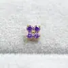 Pendientes de aleación de titanio ASTMF-13 flor de cuatro pétalos de circonita ultra brillante dorados Perforación de labio de circonita con rosca interna de titanio G23