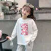 Camiseta de Manga Larga de Dibujos Animados para Niña 2026 Primavera/Otoño Nueva Elegante Top de Cuello Redondo Infantil Capa Base de Algodón Puro