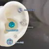 Brinco de Osso da Orelha Planeta Cheio de Diamantes Titânio Aço Parafuso Coclear Brincos de Design Único com Pingente de Saturno para Mulheres