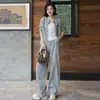 Conjunto esportivo casual personalizado para mulheres, novo e estiloso cardigã jaqueta emagrecedor com calça pantalona para o outono de 2026