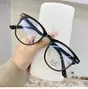 Nuevo espejo plano anti luz azul Marco de gafas de uña de arroz de moda popular Gafas de miopía terminadas para estudiantes coreanos Venta al por mayor