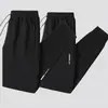 Calças esportivas de primavera e outono para homens, calças casuais espessadas, corte solto, versáteis, modernas, calças jogger de perna reta com zíper para homens