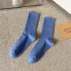 Calcetines coloridos para mujer en línea rojos súper calientes calcetines de canalé verano finos de longitud media pantimedias de moda ins color caramelo medias japonesas