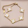 Versión coreana de pulsera simple de trébol de cuatro hojas y cinco flores para mujer, diseño de nicho, lujo ligero, sensación de alta gama, joyería que no se decolora, venta al por mayor