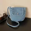 Popular bolso bandolera nuevo, bolso de primavera para teléfono móvil, bolso de hombro casual 2026, mezclilla artística, versión coreana, diseño de solapa versátil