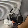Bolso de mujer con patrón tejido transfronterizo, nuevo bolso de hombro cruzado de moda de nicho para otoño 2026, bolso de mano pequeño súper popular para salir