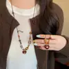 Collar de cuentas con forma de corazón atmosférico para mujer, Nueva cadena para suéter estilo chino, Cadena para el cuello de diseño de nicho 2025