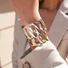 Pulsera Abierta Ovalada Hueca Estilo Metal Europeo y Americano, Simple y Única, Joyería Audaz con un Toque de Lujo de Nicho para Mujeres