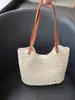 Bolsa Versátil Casual de Verão para Férias na Praia 2026 Novo Estilo Rattan Trançado Vazado Bolsa de Ombro Tote para o Dia a Dia