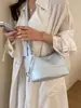Bolso de uso diario para mujer 2026 nuevo elegante retro de un solo hombro casual simple moda temperamento bandolera