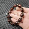 Pulsera de ágata de Xizang con cuentas una, dos, tres, cuatro, cinco, seis, nueve ojos colmillo de tigre Ruyi joyería pulsera de jade luantong