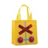 Saco de embalagem para presente com tema de trem de desenho animado, saco de tecido não tecido, bolsa tote para presente de festa com placas de trânsito atacado