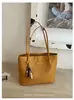 Bolso de mano tejido de alta gama de nicho transfronterizo para mujer, nuevo de verano 2026, gran capacidad, con cuentas, para ir al trabajo, de un solo hombro