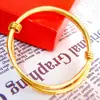 Pulsera de aleación chapada en oro de 24k imitación oro pulsera de novia color dorado protección de color ajustable de empujar y tirar pulsera de terrier de yuan accesorios