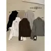 ULOUR/U grão chegada nova outono cedo estilo simples coreano corte justo valoriza proteção solar gola de renda manga longa camiseta feminina T75888