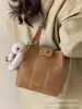 Bolso de Nicho de Gama Alta para Mujer Otoño e Invierno 2025 Nuevo Bolso Cruzado de Hombro Único Informal con Empalme Bolso Cubo Popular de Instagram