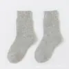 Calcetines de lana para niños una generación de gruesos cálidos otoño e invierno niños y niñas calcetines infantiles con forro polar venta al por mayor invierno