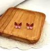 Pendientes de Mariposa Novedosos y de Moda en Acero de Titanio con Goteo de Aceite para Mujer, Pendientes Pequeños de Acero Inoxidable de Alta Gama Estilo Chanel al por Mayor