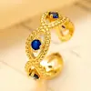2026 Venta Caliente Moda Europea y Americana Anillo Serie Ojo Maligno Incrustado con Circonita Ojos Azules Abiertos Anillo Ajustable para Mujer