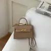Bolsos de moda y tendencia en colores de bloques de color de nicho para mujer, nuevos bolsos cruzados versátiles 2026, bolsos de mano exquisitos, bolsos cuadrados pequeños populares