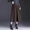 Falda de longitud media de cintura alta adelgazante línea A versátil longitud media dobladillo ancho falda de mujer retro para ir al trabajo otoño caída cubre caderas media