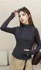 La nueva chaqueta de yoga con cuello alto de Lulu para mujer, con una sensación de nude, es una prenda superior de manga larga con cremallera para correr y fitness que tiene un efecto adelgazante.