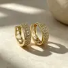 Pendientes de superventas transfronterizos europeos y americanos, cierres de oreja de circonita de cobre, totalmente incrustados de diamantes, adecuados para ir al trabajo, con un toque de lujo ligero y de alta gama, pendientes para mujer