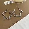 Pendientes Minimalistas Exagerados de Chica Picante con Estrella Hueca para Mujer, Pendientes Versátiles de Moda de Lujo Ligero de Gama Alta