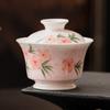 Tigela Coberta Rosa Pêssego Pintada à Mão com Flores de Pessegueiro Conjunto Único de Chá Kung Fu de Alto Padrão Conjunto de Chá Que Não Queima as Mãos Tigela de Chá de Cerâmica Xícara de Chá com Tampa