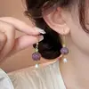 2024 Novo estilo exclusivo retro elegante brincos mulheres luz luxo nicho design high-end gancho de orelha nova joia de orelha chinesa