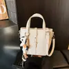 Bolso tipo cubo súper popular para mujer 2026 nueva moda bolso cruzado versátil bolso de mano pequeño de moda para verano