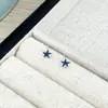 Pendientes asimétricos de estrella de mar y concha para mujer, nicho y geniales, pendientes versátiles de estilo coreano, lujo ligero con diseño único