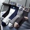 Meias Zhuji meias masculinas meias masculinas negócios letras verticais prateadas meias de outono e inverno meias para esportes de inverno meias atacado