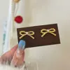 Brincos Redondos com Laço de Pérolas Doces e Exquisitos, Design de Nicho, Modernos e Versáteis, Luxo Acessível, Brincos de Alta Qualidade e Elegantes para Mulheres