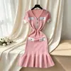 Nuevo Vestido de Verano Estilo Europeo y Americano Elegante de Punto Bloque de Color Ajustado Cuello en V Ceñido a la Cintura Manga Corta