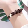Reloj de mujer GEDI estilo antiguo con forma de barril, esfera pequeña, correa de cuero, marcadores de números romanos vintage, marrón oscuro