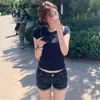 Shorts de Mezclilla Azul Oscuro para Mujer Verano 2025 Tendencia Versátil Nuevo Cintura Alta Ajustados Borde Enrollado Sexy Pantalones de Línea A