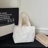 Bolsa Tote Tecido Brilhante Estrela Estilo Coreano Nova Primavera Grande Capacidade Ombro Único Bolsa de Mão Tendência para Trabalho e Dia a Dia