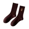 Calcetines de punto con letra C a media pantorrilla para mujer Otoño/Invierno Calcetines deportivos para hombre Estilo Pareja Ins Tendencia Alta Elasticidad Calcetines Largos de Algodón