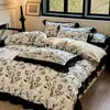 Estilo Hepburn Francés 2025 Nuevo Juego de Cuatro Piezas Algodón Puro Floral Retro Encaje Negro Funda Nórdica Ropa de Cama Venta al por Mayor