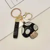 Chaveiro criativo em formato de cogumelo, transfronteiriço, leve e luxuoso, com adornos de diamante, material de PU moderno, charmoso de bolsa requintado estilo coreano e japonês, e um acessório fofo para meninas
