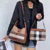 Bolsa Feminina 2026 Nova Tendência Xadrez Couro Genuíno Bolsa Médica Bolsa de Mãe Bolsa Almofada Ombro Único Transversal Bolsa de Mão Bolsa Lindy