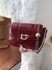 Bolso de sillín de diseño de nicho, casual, simple, texturizado, de moda, moderno, nuevo para verano 2026, bolso de hombro cruzado para mujer